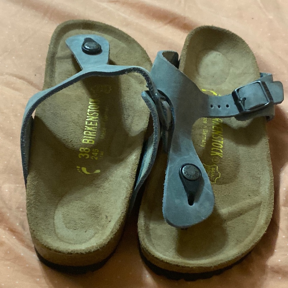 Birkenstock tong sandals.